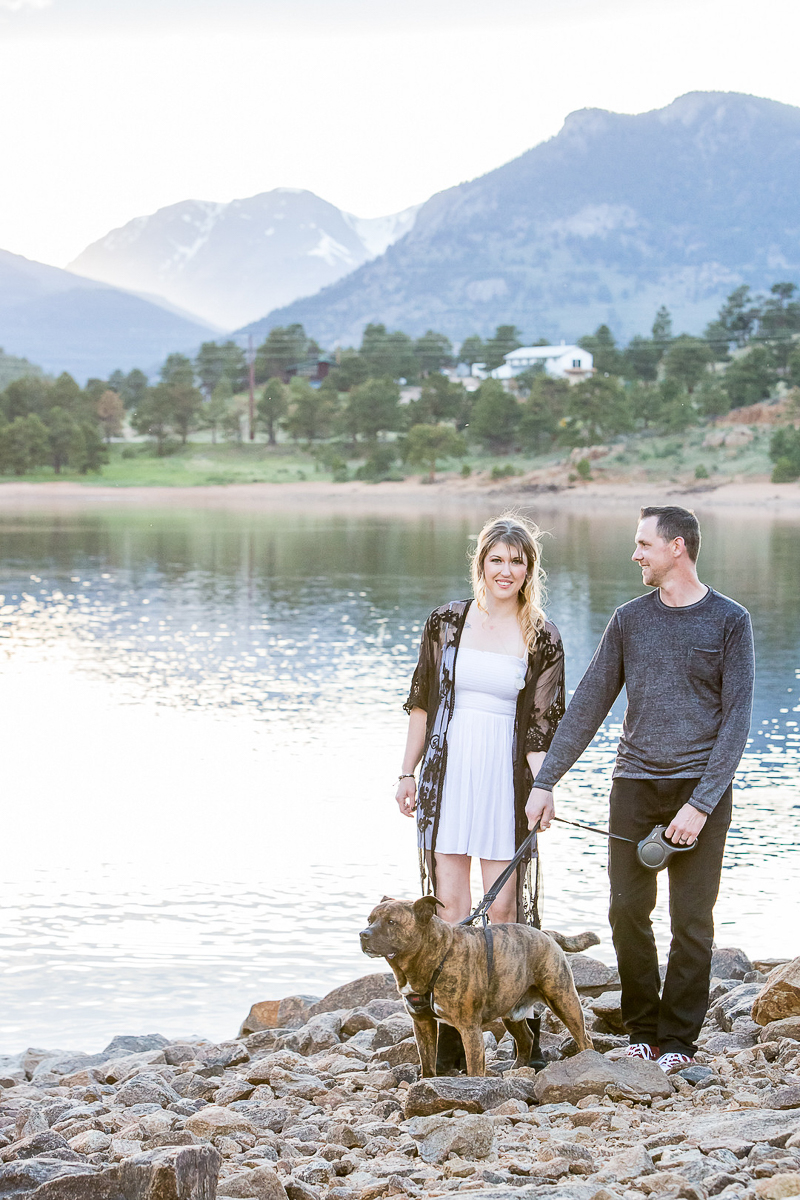 dog and couple in front of lake, dog-friendly portrait ideas | © Nichole Emerson Photography 
