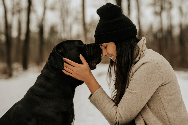 woman and Cane Corso, head to nose, love between dog and human | lifestyle dog photography ©Tomo.photography 
