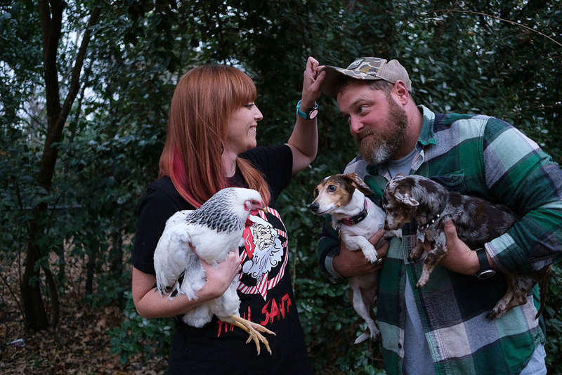 family Christmas portraits with chicken and dogs | © Hallie Sigwing Photography, Denton Texas