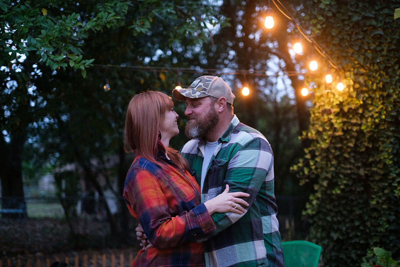 married couple embracing, at home portrait session | © Hallie Sigwing Photography, Denton Texas