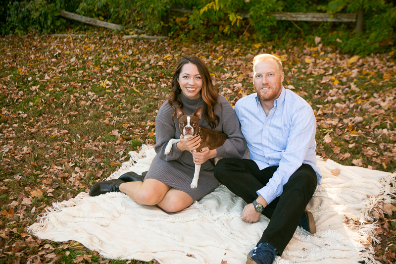 couple sitting on blanket with Boston Terrier | ©Mandy Whitley Photography