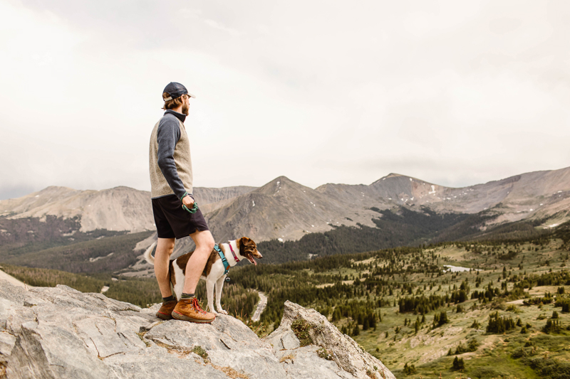 man and dog standing on overlook | ©Sheena Shahangian Photography | Adventure Elopement Photography