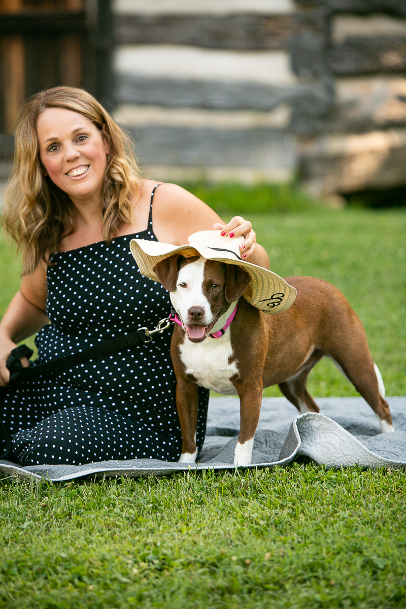 woman and her dog, dog wearing straw hat, dog photography ideas | ©Mandy Whitley Photography