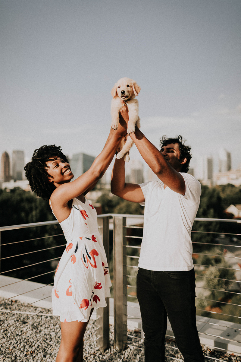 couple holding dog up, "everything the light touches" | ©Sheena Shahangian Photography