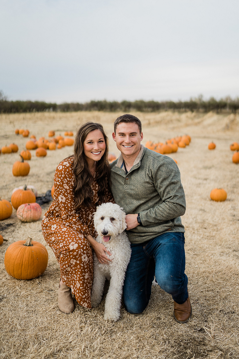 dog-friendly family photos in pumpkin patch, © Erica Jane Photography