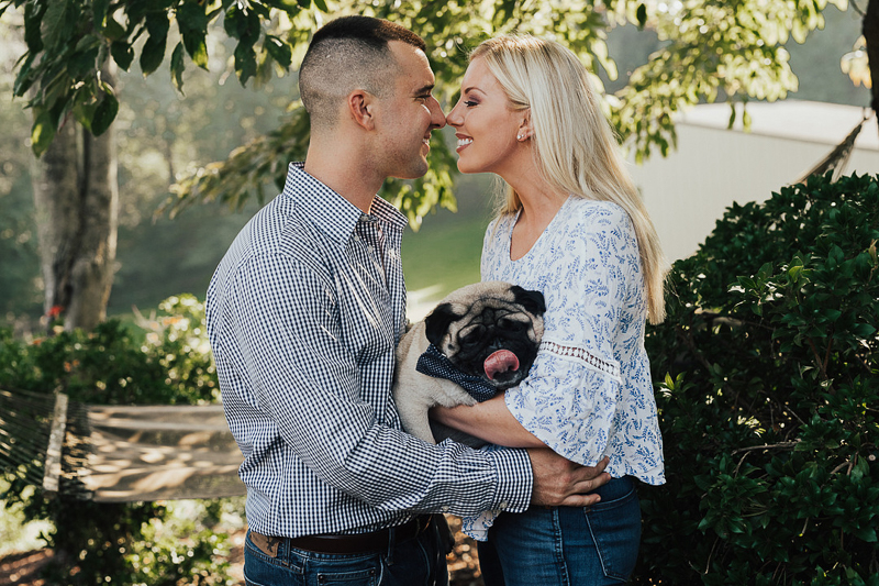 Dog-friendly Engagement Session with a Pug | couple holding Pug | ©Tyler Boye Photography