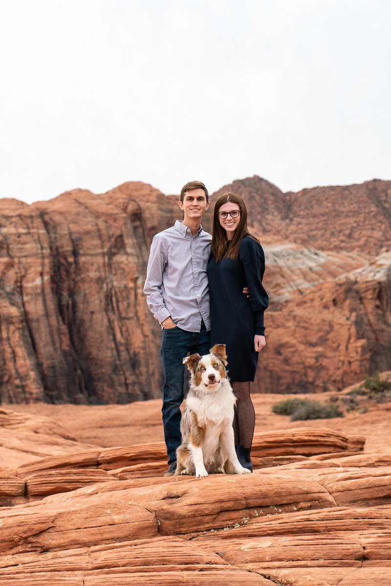 couple standing with their dog in Utah State Park| © AW Creates 