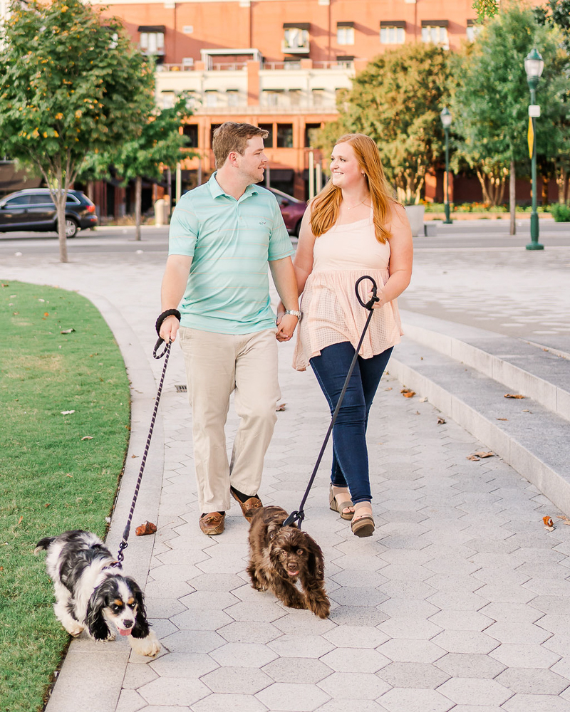 couple walking their dogs on sidewalk, Chattanooga | ©Sarah Larae Photography