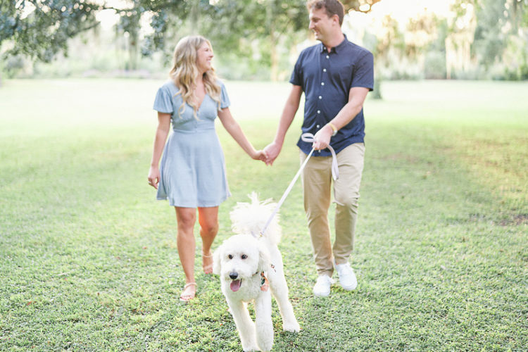 couple walking their dog | ©Cushla Beasley Wedding Photography dog-friendly engagement photos |