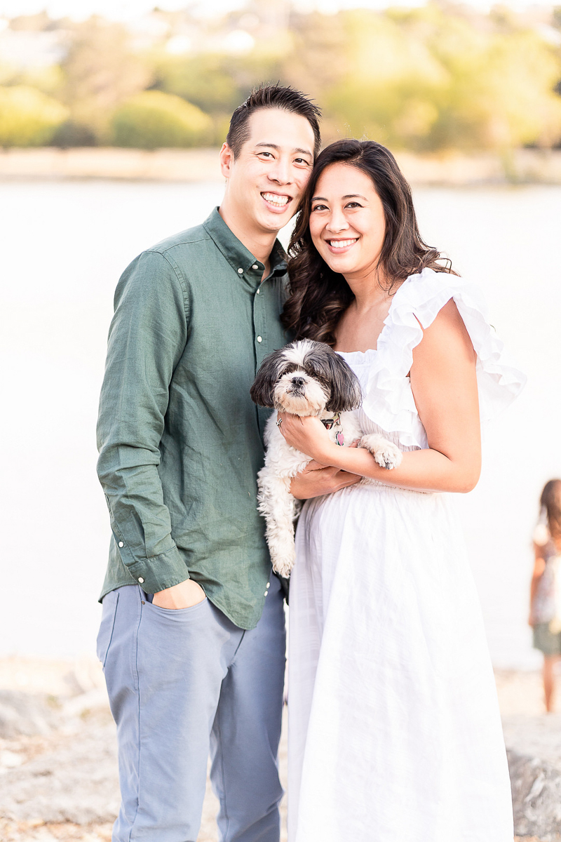 couple holding a small dog | ©Laura Michele Photography, San Jose, California