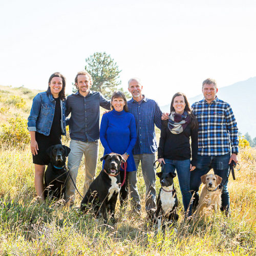 6 humans, 4 dogs standing on hillside, dog-friendly family portraits, ©Nichole Emerson Photography