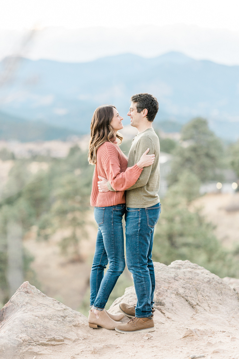 couple embracing, Mount Falcon engagement portraits | ©Mel Schroeder Photography, Denver based Wedding Photographer